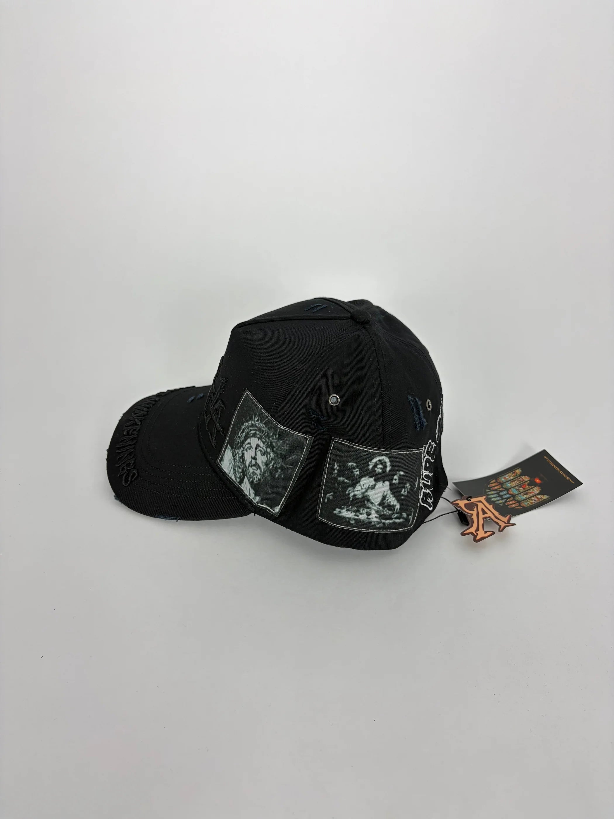 Rude Awakenings The Messiah gorra unisex Stylo 88, detalle de tela y costuras — cap streetwear Chile
